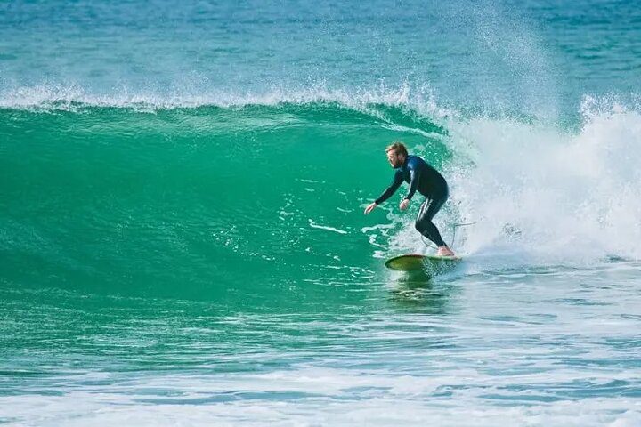 Surfing Strandhill waves. Sligo. Guided